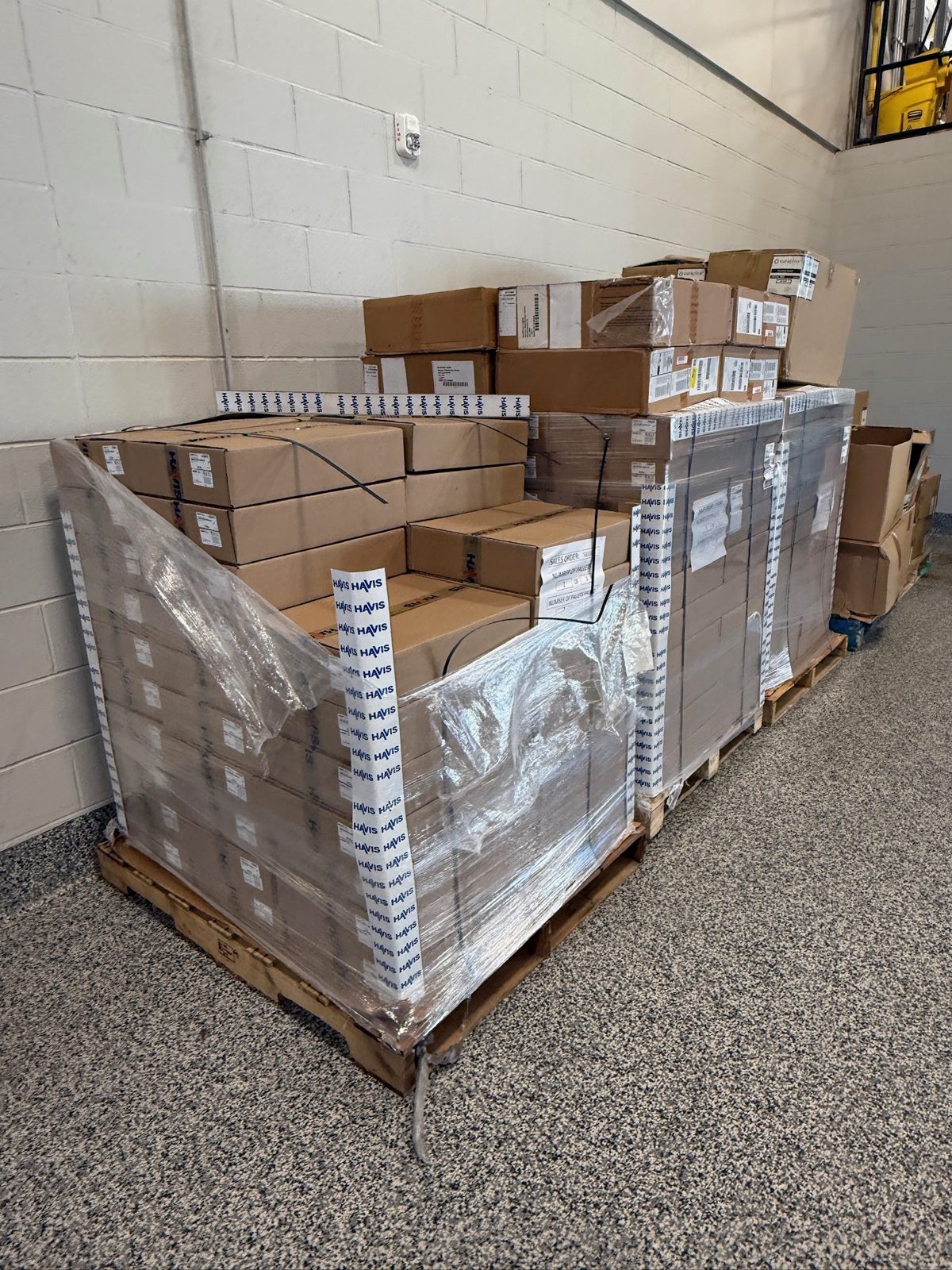 Pallets of Havis equipment for a large-scale fleet project.